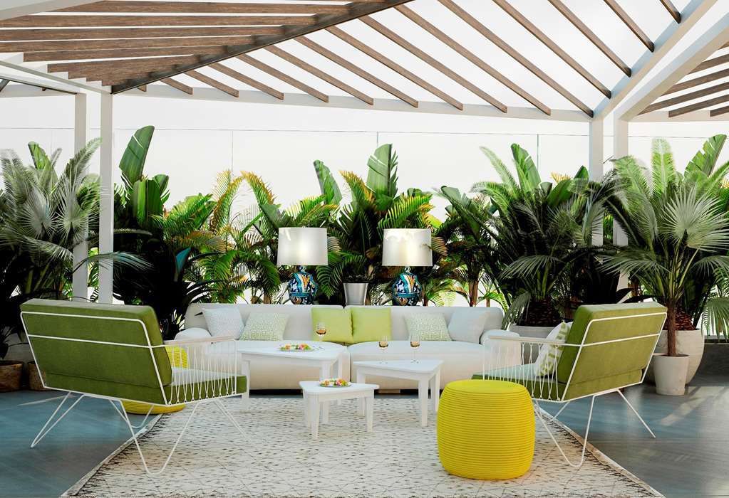 Hilton Tanger City Center Restoran fotoğraf The interior of the hotel